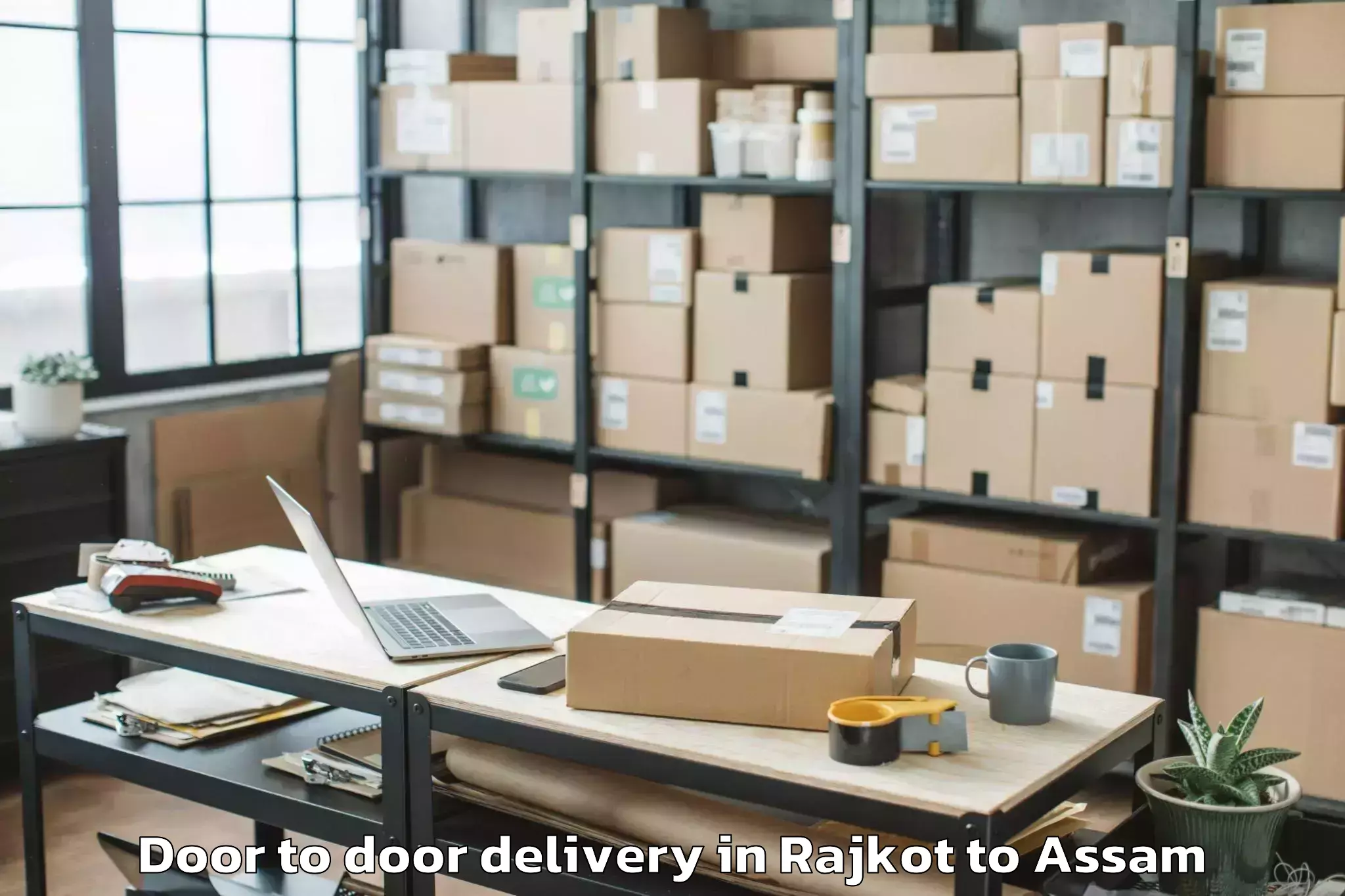 Book Rajkot to Salonibari Airport Tez Door To Door Delivery